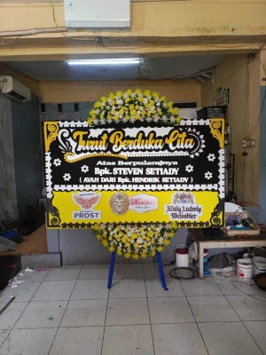 Papan Bunga di Kayu Putih