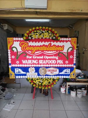 Papan Bunga di Kayu Putih